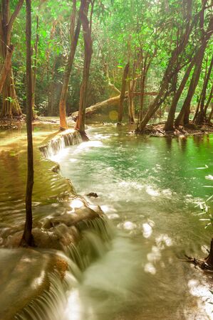Deep forest waterfall at Huay Mae Kamin waterfall National Park Kanchanaburi Thailandの写真素材
