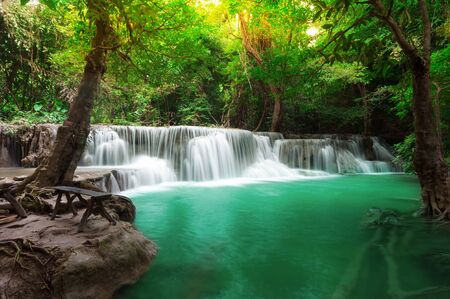 Deep forest waterfall at Huay Mae Kamin waterfall National Park Kanchanaburi Thailandの写真素材