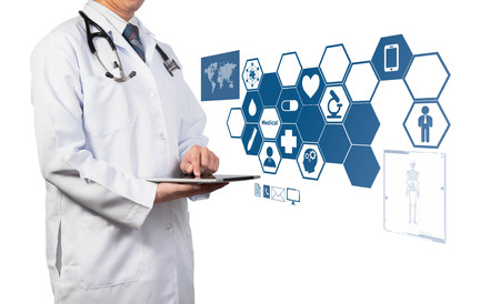 Doctor working with tablet on medical conceptの写真素材
