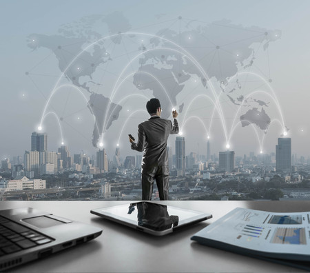 Businessman pressing on digital virtual screen, globalization marketing conceptualの写真素材