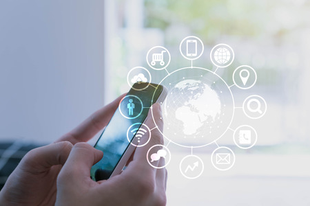 Man using smartphone with various kind of icon, internet of things conceptual