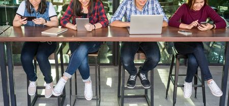 People using smartphone, laptop and tablet together in line, social media concept
