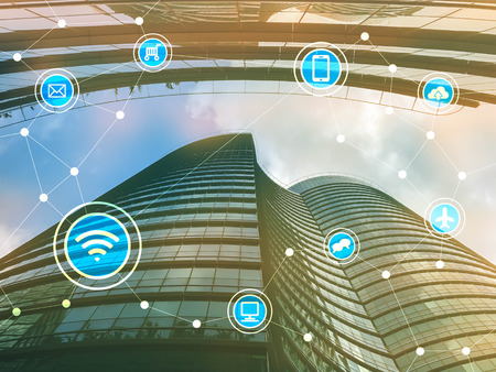 City and wireless icons of communication network, IoT(Internet of Things), era of internet, internet of every things, internet in every day lifesの写真素材