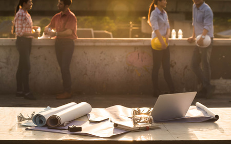 Work desk of construction engineer outdoor at after work daysの写真素材