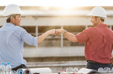 two construction engineer meet and agree for concstruction plan, construction engineering conceptualの写真素材