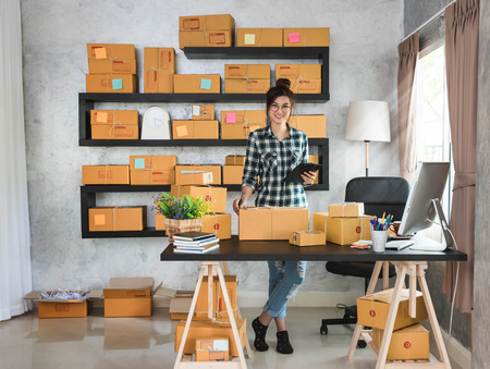 Happy young entrepreneur, teenager business owner work at home, alpha generation life style.の写真素材