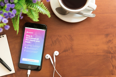 Bangkok ,Thailand DECEMBER 04, 2016 : Iphone 7 Plus jet black series with apple music application on screenのeditorial素材