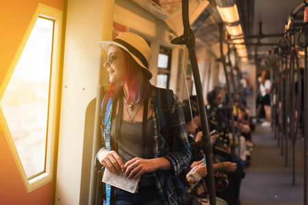 Woman westerner write admire view from train's windowの写真素材