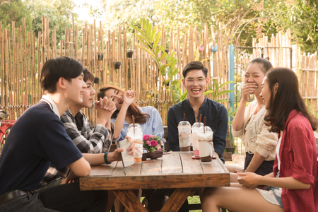 Group of friends hang out in cafeの写真素材