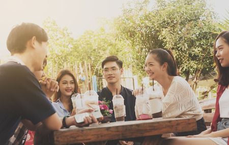 Group of friends hang out in cafeの写真素材
