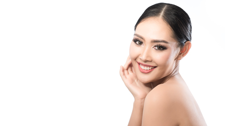Beauty shot of young pretty asian woman with clear skin ongrey background, for skin ad and cosmetology with copy space for text insertionの写真素材