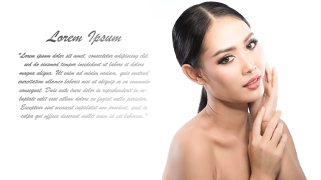 Beauty shot of young pretty asian woman with clear skin ongrey background, for skin ad and cosmetology with copy space for text insertionの写真素材