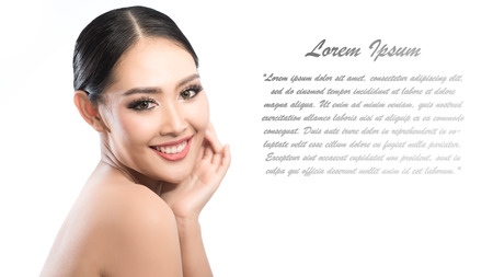 Beauty shot of young pretty asian woman with clear skin ongrey background, for skin ad and cosmetology with copy space for text insertionの写真素材