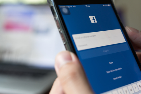 BANGKOK, THAILAND- 06 July 2018 : Facebook log in screen on mobile phoneのeditorial素材
