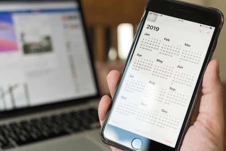 BANGKOK, THAILAND- 02 July 2018 :Hands of man use Iphone 7 plus plan for the year of 2019のeditorial素材