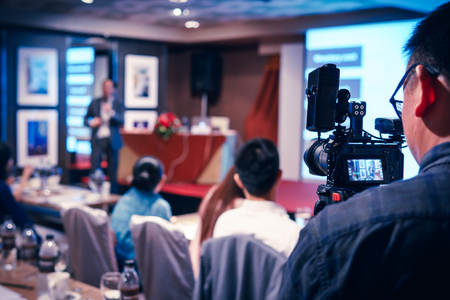 Black mirrorless camera recording seminar with optional accessory, technology transformation of mirrorless cameraの写真素材