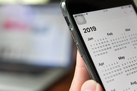 BANGKOK, THAILAND- 02 July 2018 :Hands of man use Iphone 7 plus plan for the year of 2019のeditorial素材