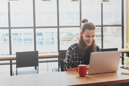 freelance working in coffee shop, Nomad worker conceptualの写真素材