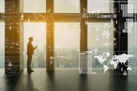 Business man use smartphone with interface of digital data, business technology conceptualの写真素材