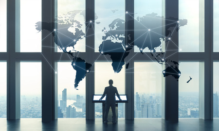 Business man working with computer interface of globalization conceptualの写真素材