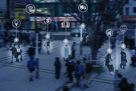 people in public area use internet, technology in everyday lifeの写真素材