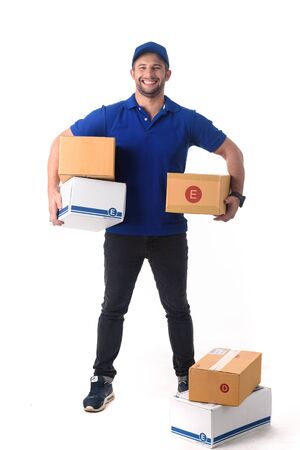 Happy delivery man with many boxes, online delivery conceptualの写真素材
