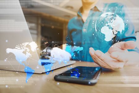 Globalization conceptual of technology use laptop and smartphone, wireless internet connection every whereの写真素材