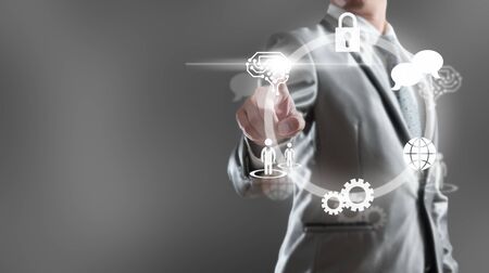 Businessman woking with icon of AI, security, human resource, globalization and network technologyの写真素材