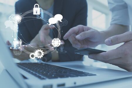 Businessman working with icon of AI, security, human resource, globalization and network technologyの写真素材