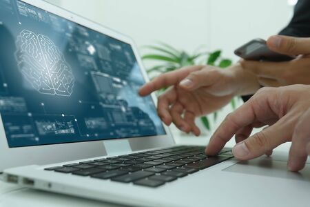 AI, artificial intelligence conceptual with computer interface of business team, big data management use AI technology computingの写真素材