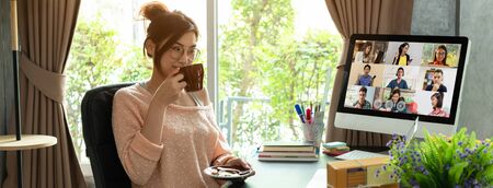 Asian woman work from home during corona virus, COVID-19 out break use laptop for teleconference...