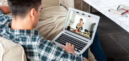 Man attend course online of young teenager teach about cooking healthy food
