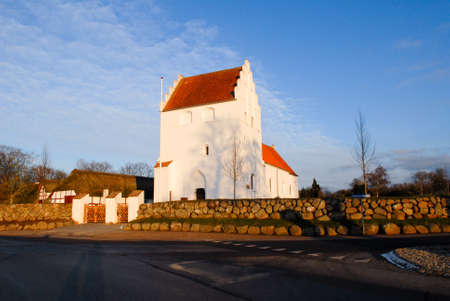 The idyllic church of KÃ¸lstrup in a sunny afternoonの写真素材