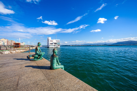 SANTANDER, SPAIN - OCTOBER 15, 2012. View of the bay of Santander (Cantabria, Spain). Belongs to the select club of the most beautiful bays in the world. Includes the facade of the Royal Maritime Club of Santander (RCMS) and sculptures of Los Raqueros.のeditorial素材