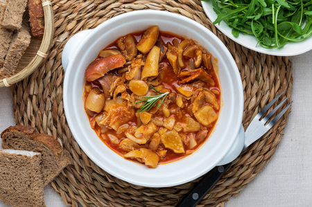 Tripes in clay pot. Top view. Rustic appearance. (Callos a la MadrileÃ±a).の写真素材