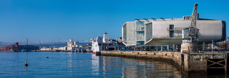 SANTANDER, SPAIN - February 21, 2019. BotÃ­n Center (work of architect Renzo Piano) on a sunny day. In the foreground, the Stone Crane.のeditorial素材