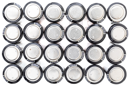 Texture AA electric batteries (AAA). Positive pole view (+ -). White background.の写真素材