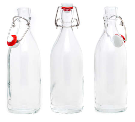 Several glass bottles with 500 ml soda type closures. Without label and isolated on white background.の写真素材