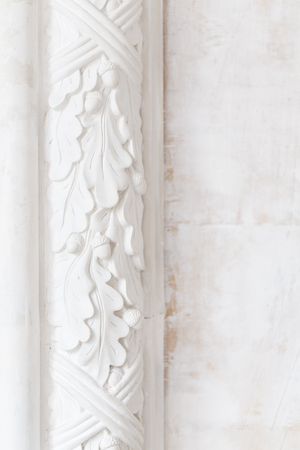 Beautiful ornate white decorative plaster moldings in studioの写真素材