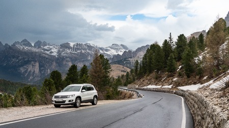 South tyrol, Italy - May 03 2018: Travel by car on a mountain serpentine. Spring landscape.のeditorial素材