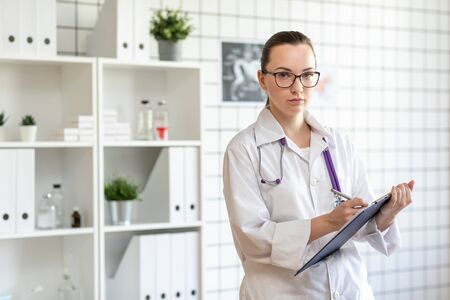 A young doctor, a veterinarian at the clinic.の写真素材