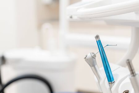 Close-up dental high speed turbine. Dental work in clinic. Operation, tooth replacement. Medicine, health, stomatology concept. Office where dentist conducts inspection and concludes.の写真素材