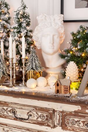 Lots of Christmas decorations standing on wooden desk. Selective focusの写真素材