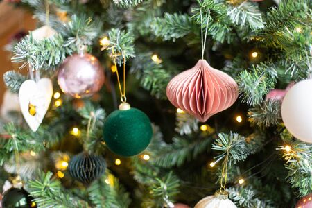 Closeup of Christmass decoration toys hanging on Chtistmass treeの写真素材