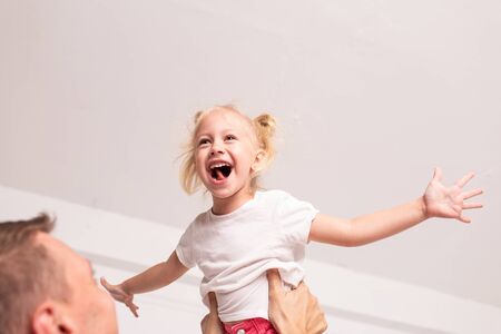 Father and his daughter playing together at fathers dayの写真素材