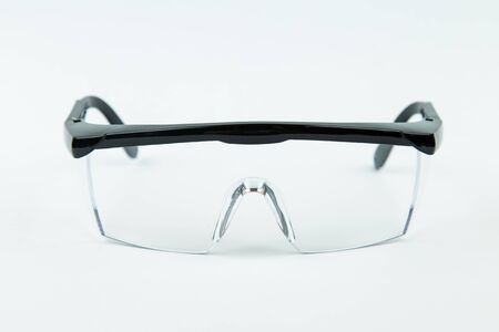 Safety Glasses isolated on white background. Selective focus.の写真素材