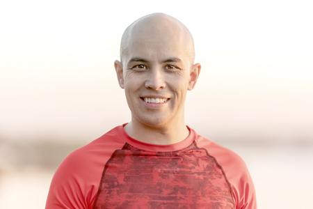 Portrait of a young athletic man outdoors. Fitness, sport and healthy lifestyle conceptの写真素材