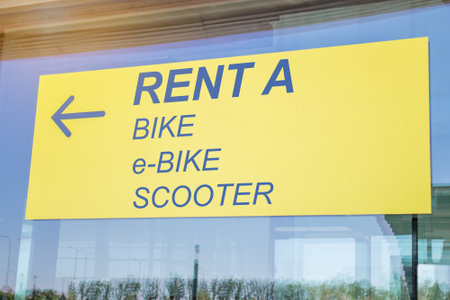 sign for renting a bike, e-bike, scooterの写真素材