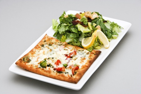 Square Vegetarian Pizza with a Caesar  Salad