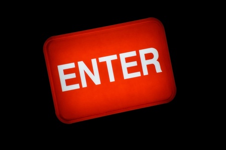 Backlit red enter sign or button.の写真素材